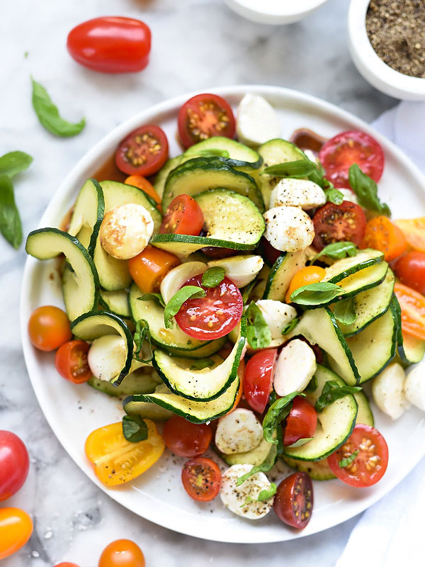 Fresh vegetable salad with zucchini and tomatoes